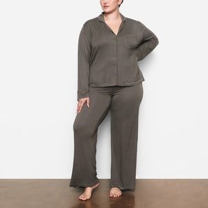 Skims sleep button up top